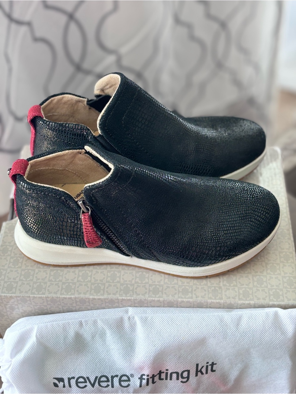 Revere Black Slip-On Athletic Sneakers with Pink Tabs